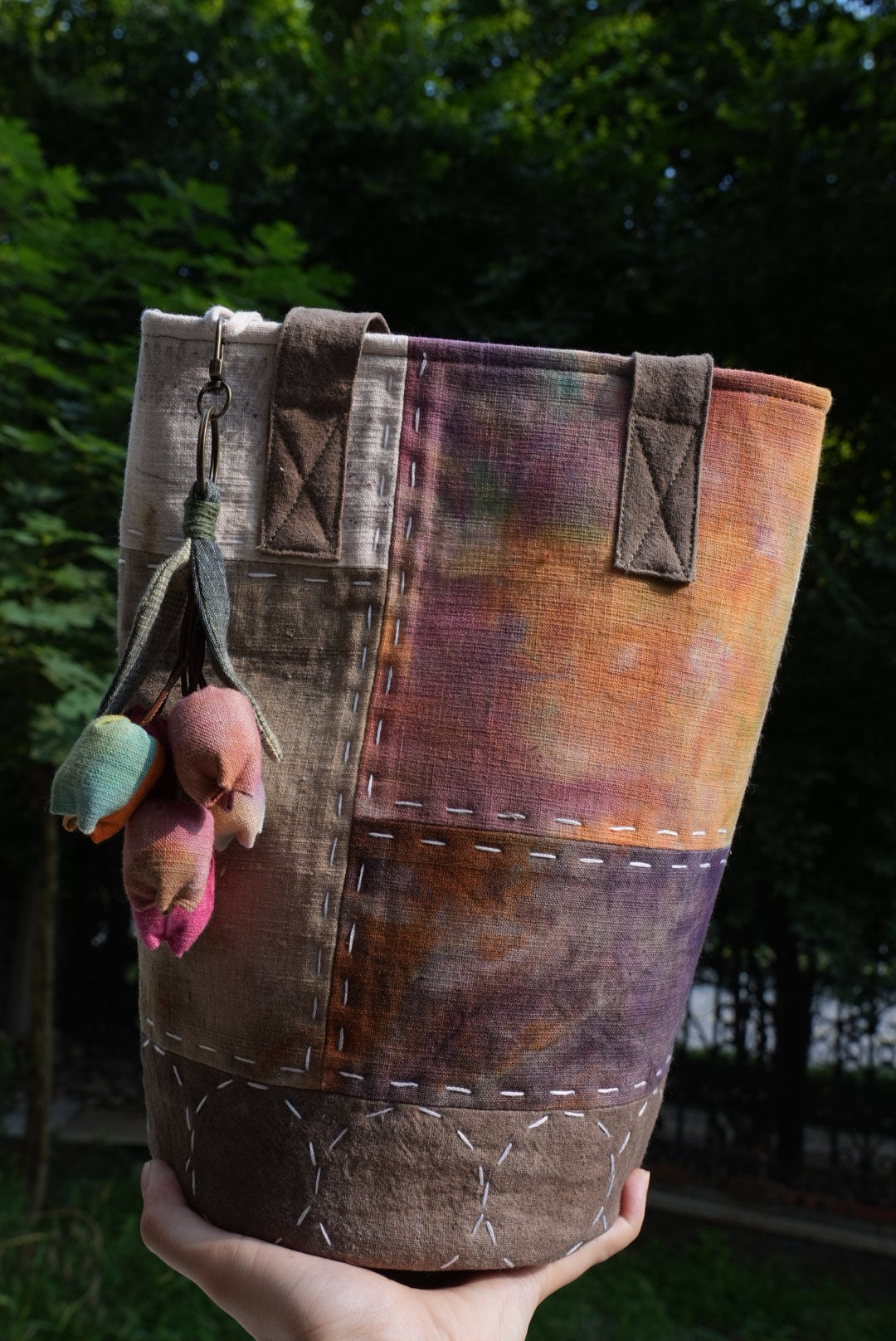 Hand-Stitched Bucket Tote with Lily Charm