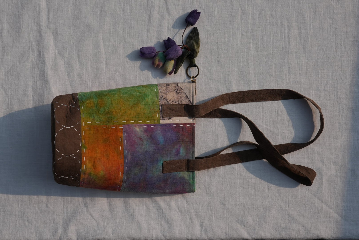 Hand-Stitched Bucket Tote with Lily Charm