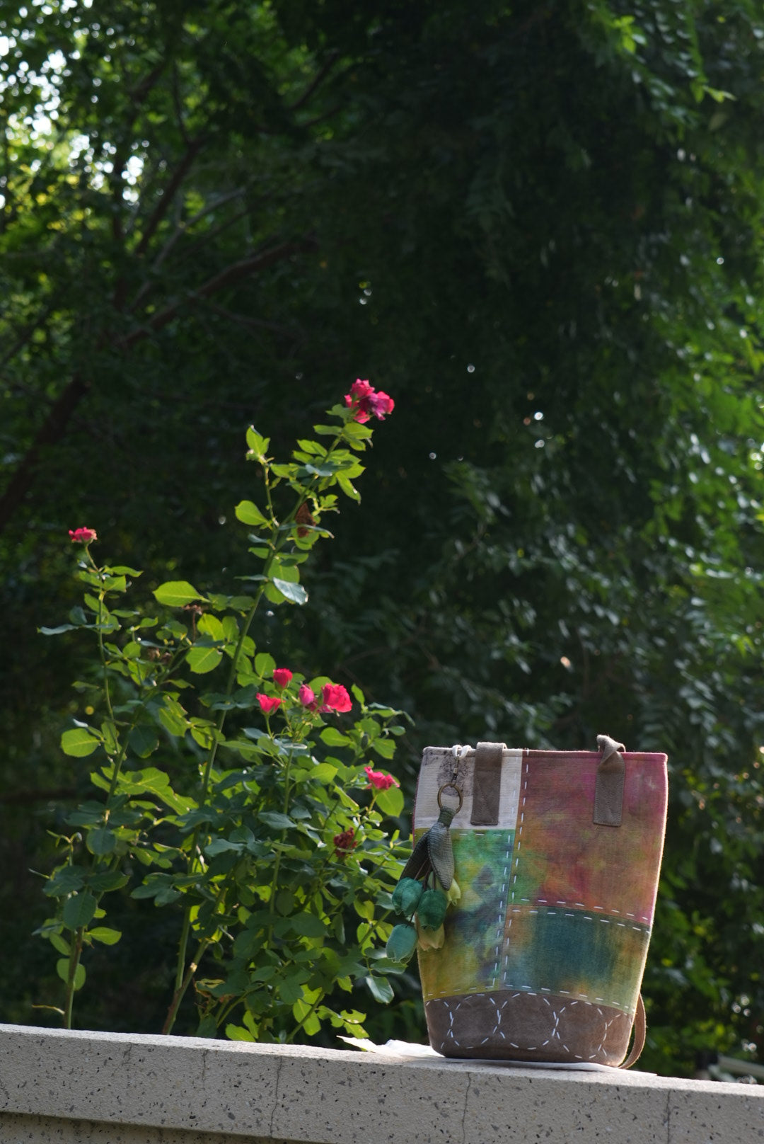 Hand-Stitched Bucket Tote with Lily Charm